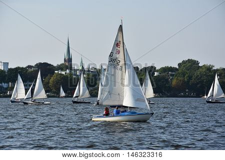 HAMBURG, GERMANY - AUG 26: Sailboats on Lake Alster in Hamburg, Germany, as seen on Aug 26, 2016. Hamburg was founded at the mouth of Alster river in the 9th century and has been used as a port since.