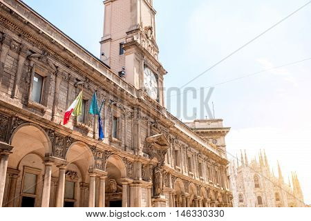 The Giureconsulti palace with clock tower on Mercanti square near Duomo square in Milan city center