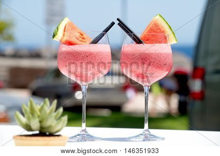 refreshing fruit cockail with watermelon in big glasses for summer parties