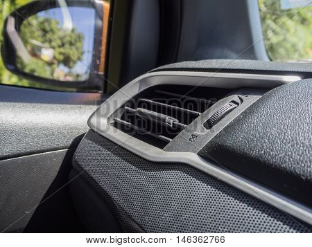 Air Conditioner in front of car left