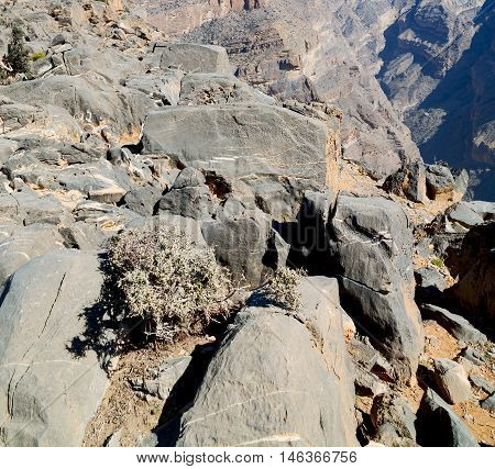 In Oman  The Old Mountain Gorge And Canyon The Deep Cloudy  Sky