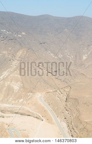 In Oman  The Old Mountain Gorge And Canyon The Deep Cloudy  Sky
