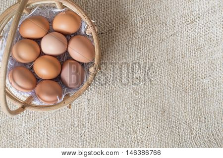 Eggs In Bamboo Basket On Jute Sack