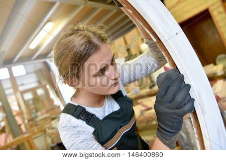Young woman in crafstmanship school, training course