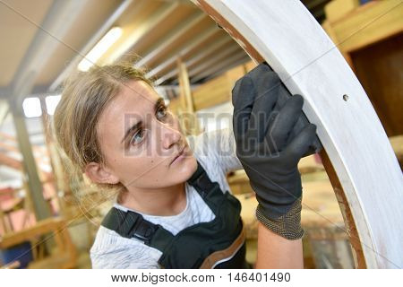 Young woman in crafstmanship school, training course