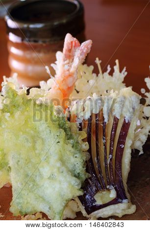Japanese tempura set consisting of shrimp egg plant carrot and shiso leaf
