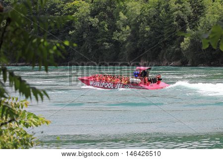 NIAGARA FALLS, CANADA - JULY 15, 2016.
A popular tourist attraction the Whirlpool Jet Boat tour is a large jet boat tour that's sure to thrill and excite. The journey begins at the mouth of Lake Ontario and goes upstream till it reaches the gorge and rapi