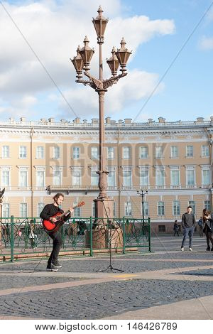 St. Petersburg, Russia-september 09,2016: The Street Musician Plays On The Street Of St. Petersburg.