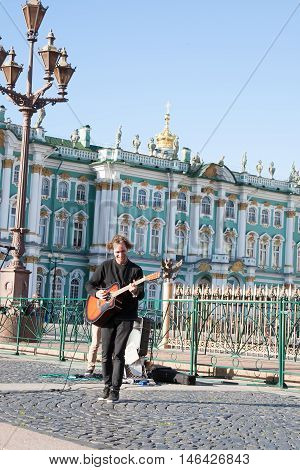 St. Petersburg, Russia-september 09,2016: The Street Musician Plays On The Street Of St. Petersburg.