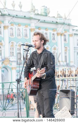 St. Petersburg, Russia-september 09,2016: The Street Musician Plays On The Street Of St. Petersburg.