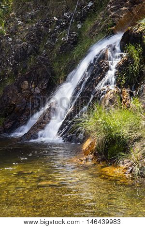 Beautiful Waterfall In Sunny Day