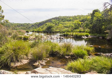 Beautiful Lake In Sunny Day Formed By Waterfalls - Serra Da Canastra National Park - Minas Gerais, B