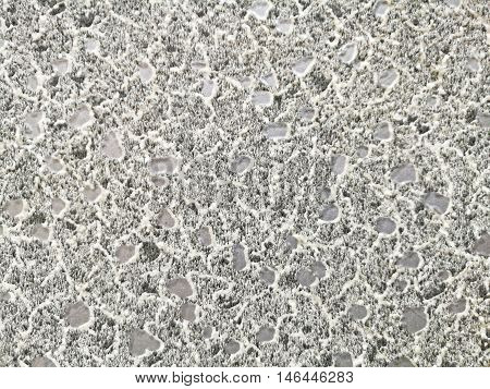 Monotone texture in cold colors of the wallpaper.