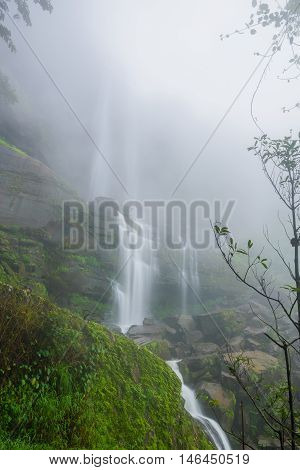 Landscape of Tad Huay Ping waterfall in deep rain forest of Bolaven Plateau Champasak Laos.