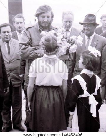 Yangiyer Uzbekistan - May 10 1963: Pioneer girls are meeting Fidel Castro.