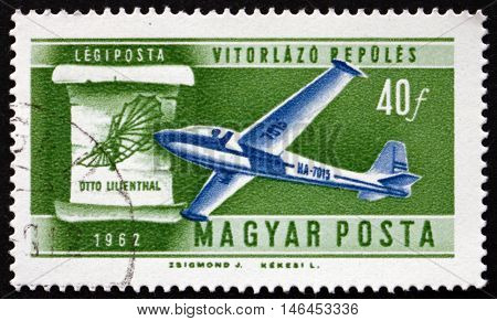 HUNGARY - CIRCA 1962: a stamp printed in Hungary shows Glider and Lilienthal's Design Flight Development circa 1962