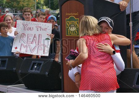 SMITHS FALLS ON CANADA SEPTEMBER 09 2016 - A 50 Editorial Image Series of Pro Golf Sensations Brooke M. Henderson and her sister Brittany Henderson giving a speech in front of their Hometown of Smiths Falls shortly after the efforts in the Summer Rio Olym