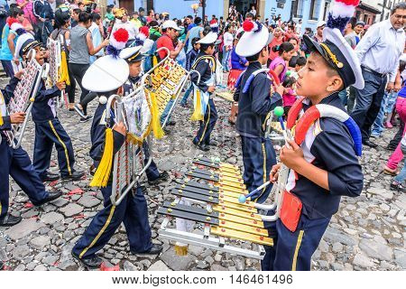 Antigua Guatemala - September 14 2015: School band marches in streets during Guatemalan Independence Day celebrations