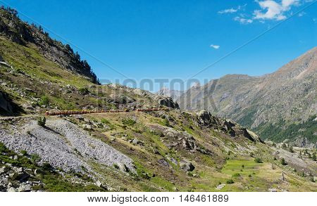 train of Artouste with cliffs in the french mountains Pyrenees
