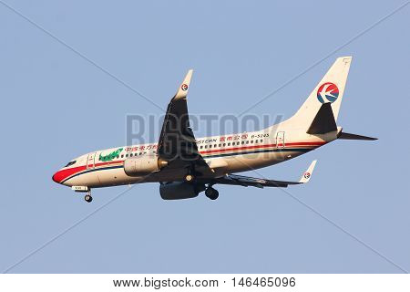 CHIANGMAI THAILAND - FEBRUARY 26 2014: B-5245 Boeing 737-700 of China Eastern Airline Landing to Chiangmai Airport from Kunming.