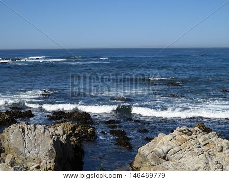 This is an image of rocks and the incoming tide at Asilomar
Beach in Pacific Grove, California.
