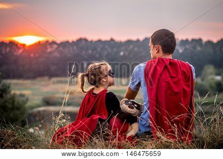 Little Girl With Dad Dressed In Super Heroes, Happy Loving Family