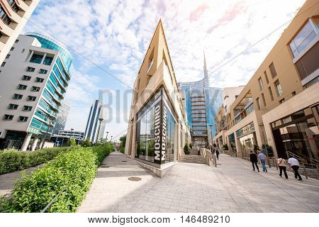 Milan, Italy - June 07, 2016: Vincenzo Capelli street with shopping boutiques and offices in Porta Nuova business district in Milan in the morning