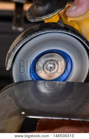 Cutting Steel With Angle Grinder At Car Service