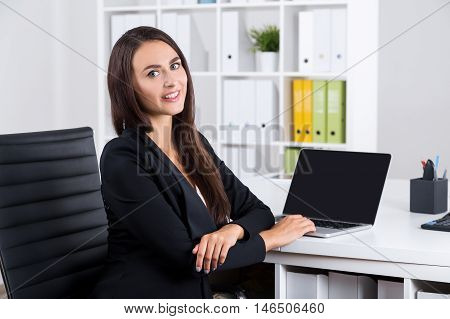 Smiling Lady With Long Hair In Office