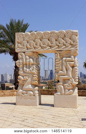 TEL AVIV, ISRAEL - August 24, 2016: modern sculpture known as the Statue of Faith, made of Galilee stone, stands at the top of Abrasha Park in the Old City of Jaffa on august 24, 2016 Tel Aviv, Israel
