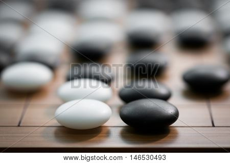 go game or Weiqi (Chinese board game)