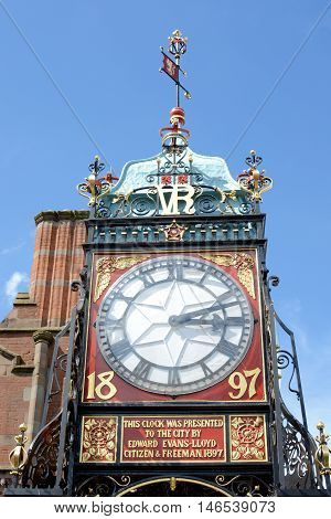 CHESTER, UK - JULY 17, 2016: Eastgate clock tower above the ancient city walls, Chester, Cheshire, UK