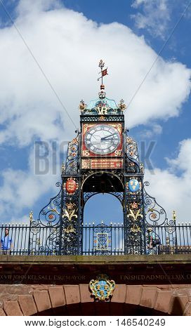 CHESTER, UK - JULY 17, 2016: Eastgate clock tower above the ancient city walls, Chester, Cheshire, UK