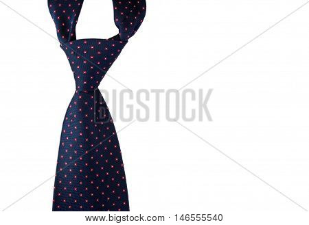 Close-up photo of dark blue men's tie isolated on white