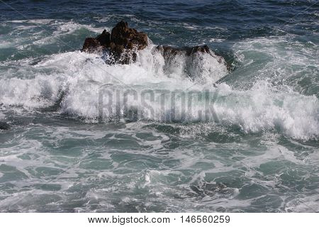 This is an image of the incoming tide taken at Asilomar Beach
in Pacific Grove, California.