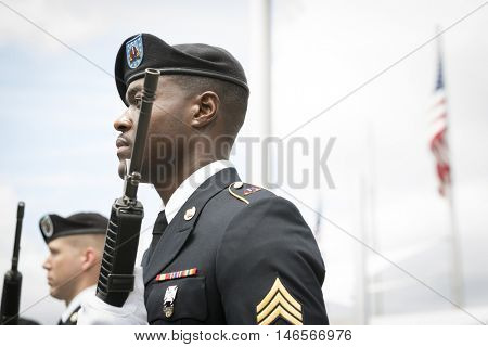NEW YORK MAY 30 2016: Personnel from the US Army 99th Regional Support Command, Fort Dix, NJ prior to the rifle salute at the Memorial Day Observance service on the Intrepid Sea, Air & Space Museum.