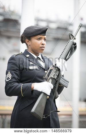 NEW YORK MAY 30 2016: Personnel from the US Army 99th Regional Support Command, Fort Dix, NJ prior to the rifle salute at the Memorial Day Observance service on the Intrepid Sea, Air & Space Museum.