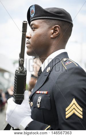 NEW YORK MAY 30 2016: Personnel from the US Army 99th Regional Support Command, Fort Dix, NJ prior to the rifle salute at the Memorial Day Observance service on the Intrepid Sea, Air & Space Museum.