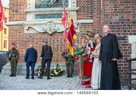 KRAKOW, POLAND - FEB 10, 2016: Unidentified participants of ceremony is the vow of first classes of the Jan III Sobieski High School (founded in 1883) at the Main Market Square near St.Mary Cathedral.