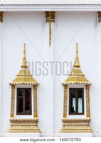 Thai style golden carving wooden window beautiful.