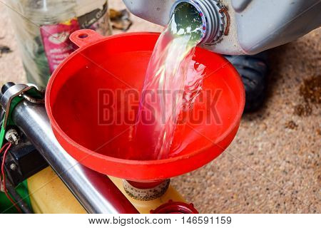 the Flowing diesel oil. Closeup.background for texture