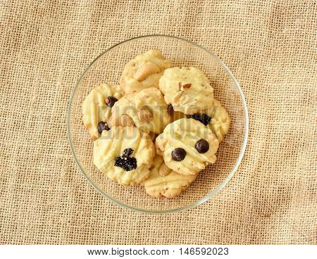 Chocolate chip cookies on brown colored cloth