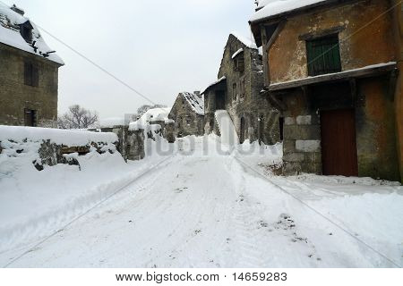 Old deserted village ruins in the middle of the winter
