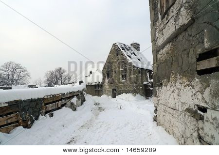 Old deserted village ruins in the middle of the winter