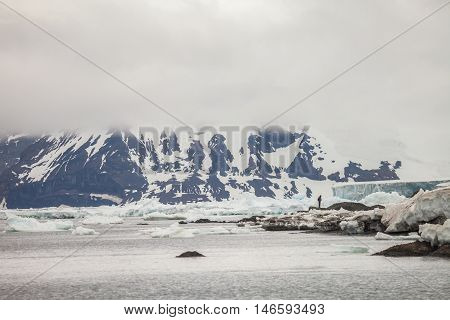 Mountains covered with snow and fog in Antarctica. landscape for background.
