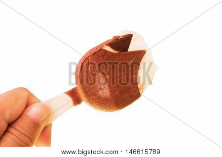 ice cream coated chocolate after bitten on white background with clipping path