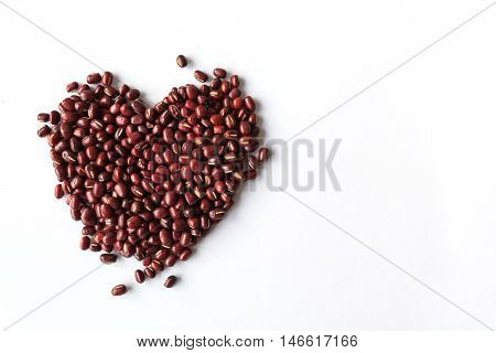 Picture of red beans set in heart the shape healthy organic seeds
