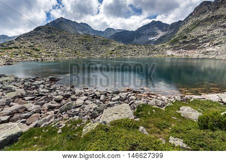 Panorama of Musala peak and reflection in Musalenski lakes,  Rila mountain, Bulgaria