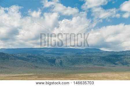 The Ngorongoro Conservation Area (NCA) is a conservation area and a UNESCO World Heritage Site located 180 km west of Arusha in the Crater Highlands area of Tanzania.