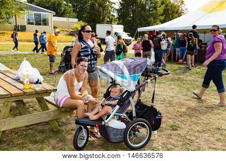 Ronks PA - September 10 2016: Eating a Whoopie pie at the Whoopie Pie Festival at Hershey Farms.